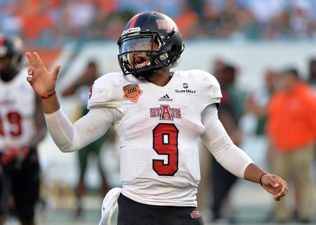 Sep 13, 2014; Miami Gardens, FL, USA; Arkansas State Red Wolves quarterback Fredi Knighten (9) reacts against the Miami Hurricanes during the second half at Sun Life Stadium. Miami won 41-20. Mandatory Credit: Steve Mitchell-USA TODAY Sports
