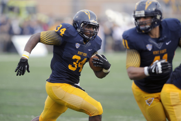 Oct 5, 2013; Kent, OH, USA; Kent State Golden Flashes running back Trayion Durham (34) runs against the Northern Illinois Huskies during the second quarter at Dix Stadium. Mandatory Credit: Ken Blaze-USA TODAY Sports