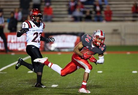 NM WR Carlos Wiggins (AP Photo/Eric Draper)