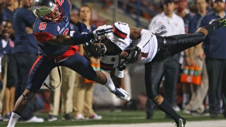 SDSU DB J.J. Whittaker intercepts a pass against Fresno State (Photo Courtesy of Gary Kazanjian/AP Photo)