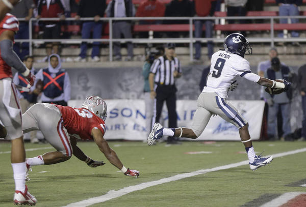 USU WR Jojo Natson crosses the goal line for a touchdown against UNLV (Photo Courtesy of Julie Jacobson/AP Photo)