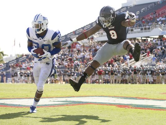 MTSU DB Kevin Byard intercepts a pass against FAU (Photo Coutesy of Associated Press)