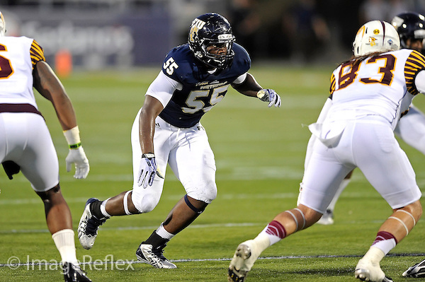 14 September 2013: FIU defensive end Michael Wakefield (55) pursues the ball carrier in the second half as the Bethune-Cookman Wildcats defeated the FIU Golden Panthers, 34-13, at FIU Stadium in Miami, Florida.