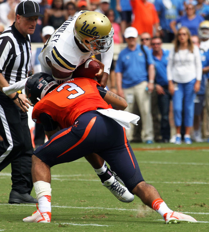 UVA S Quin Blanding tackles UCLA QB Brett Hundley (Photo Courtesy of Ryan M. Kelly/The Daily Progress)