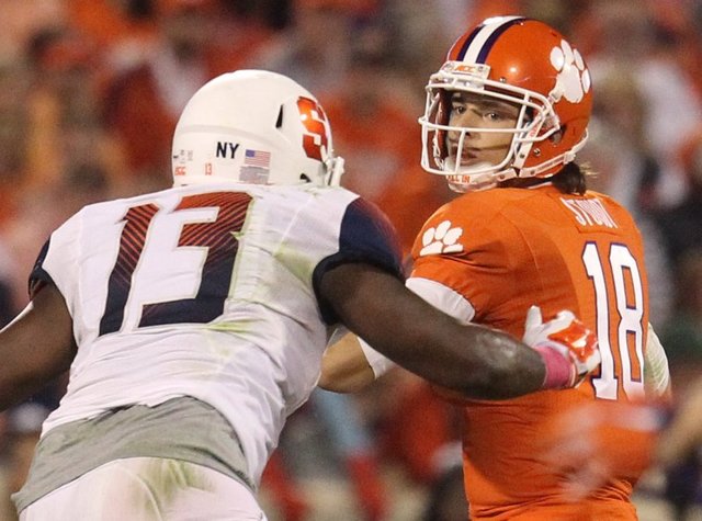 SU DE Ron Thompson pressures Clemson QB Cole Stoudt (Photo Courtesy of Nathan Gray)