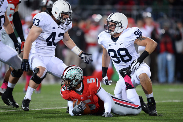 PSU DT Anthony Zettel (98) gets up to celebrate after sacking OSU QB Braxton Miller (Photo Courtesy of Jamie Sabau/Getty Images North America)