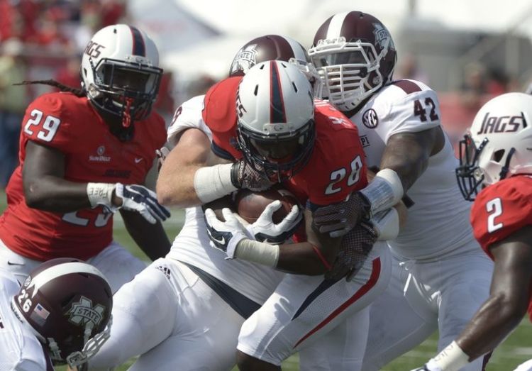 MSU LBs Beniquez and Richie Brown stop a USA ballcarrier (Photo Courtesy of Glenn Andrews/USA TODAY Sports)