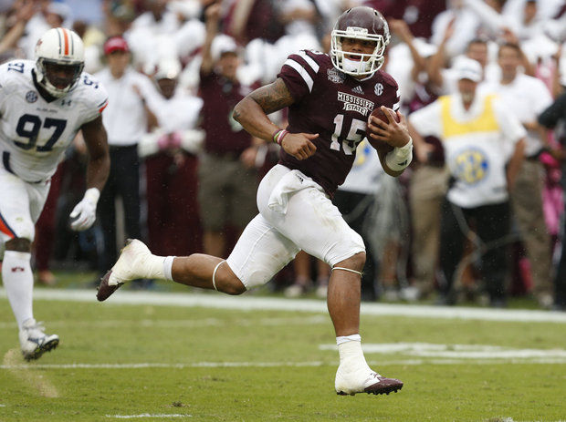 MSU QB Dak Prescott (Photo Courtesy of AP Photo/Rogelio V. Solis)