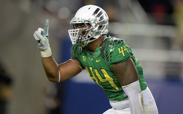 Dec 5, 2014; Santa Clara, CA, USA; Oregon Ducks defensive end DeForest Buckner (44) celebrates after a sack in the second quarter against the Arizona Wildcats in the Pac-12 Championship at Levi's Stadium. Mandatory Credit: Kirby Lee-USA TODAY Sports