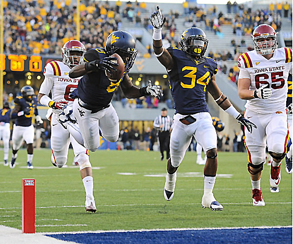 WVU S Karl Joseph dives into the end zone for a TD against ISU (Photo Courtesy of All-Pro Photography/Andrew Ferguson)