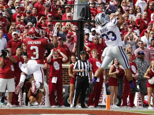 KSU CB Morgan Burns picks off a pass against OU (Photo Courtesy of Sue Ogrocki/AP Photo)