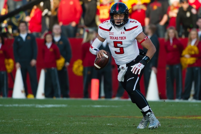 Nov 22, 2014; Ames, IA, USA; Texas Tech Red Raiders quarterback Patrick Mahomes (5) runs with the ball against the Iowa State Cyclones at Jack Trice Stadium. Mandatory Credit: Steven Branscombe-USA TODAY Sports