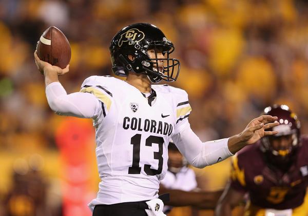 TEMPE, AZ - OCTOBER 12:  Quarterback Sefo Liufau #13 of the Colorado Buffaloes throws a pass during the college football game against the Arizona State Sun Devils at Sun Devil Stadium on October 12, 2013 in Tempe, Arizona.  (Photo by Christian Petersen/Getty Images)