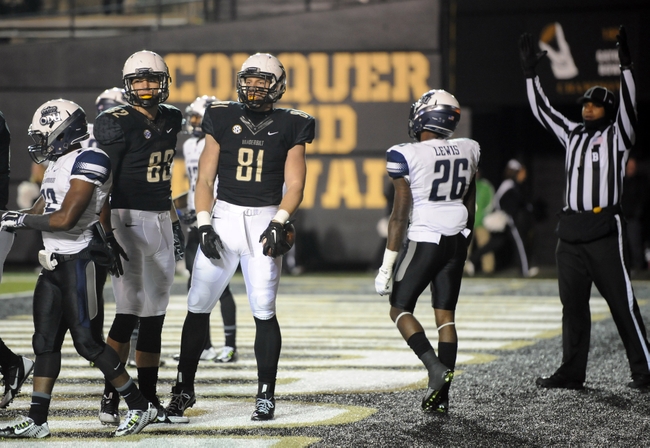 Nov 1, 2014; Nashville, TN, USA; Vanderbilt Commodores tight end Steven Scheu (81) celebrates after a touchdown reception during the first half against the Old Dominion Monarchs at Vanderbilt Stadium. Mandatory Credit: Christopher Hanewinckel-USA TODAY Sports
