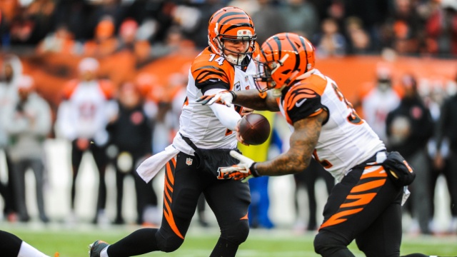 Andy Dalton hands the ball off to Jeremy Hill (Photo Courtesy of Ken Blaze/USA TODAY Sports)
