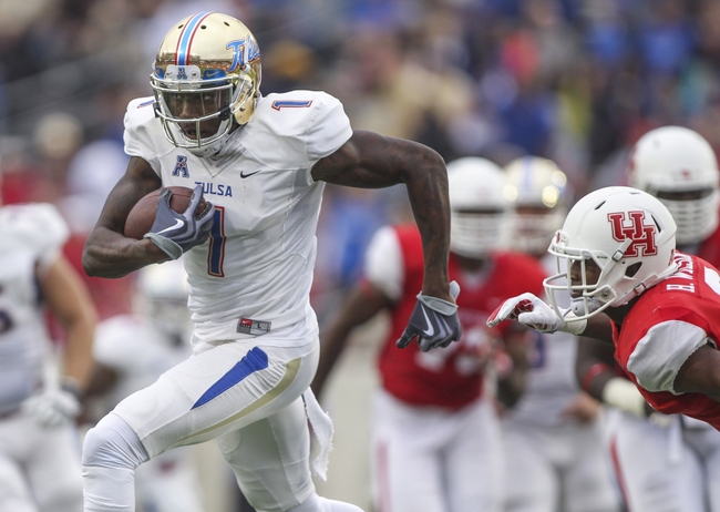 Nov 22, 2014; Houston, TX, USA; Tulsa Golden Hurricane wide receiver Keyarris Garrett (1) makes a reception during the second quarter against the Houston Cougars at TDECU Stadium. Mandatory Credit: Troy Taormina-USA TODAY Sports